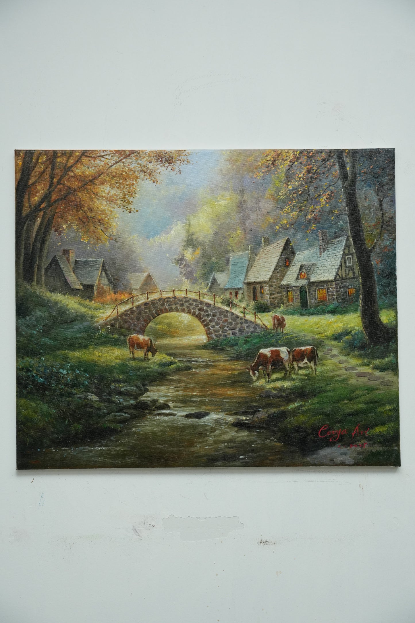 Tranquil Mountain Village with Bridge and Cattle